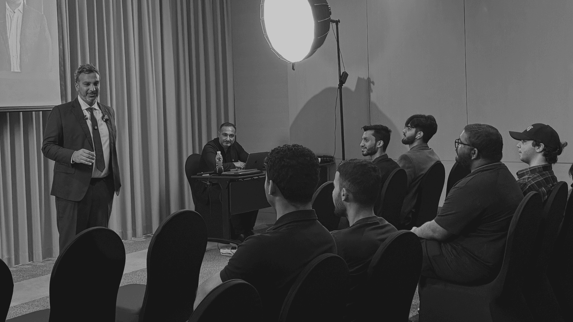 Karan Trehan speaking at a workshop